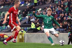 Paddy Lane crosses for Northern Ireland on his senior debut against Hungary.