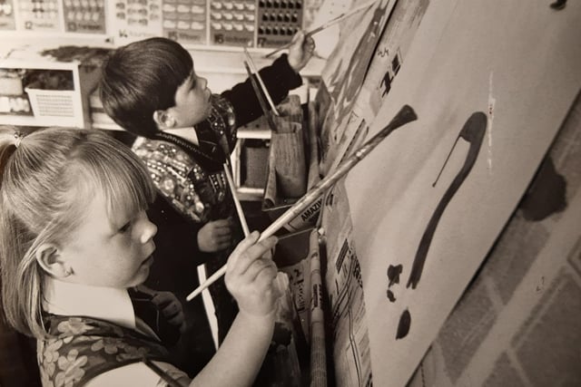 Pupils at Claremont School in September 1990 show off their artistic skills. Lisa Jones is one of the children but there's no name for the other child. Was it you?