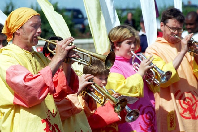 Morecambe's music man, Peter Moser (left), leads his Beat Bay Carnival Band along the promenade in Morecambe
