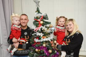 The Whittaker family are getting ready for Evie-Mae's first normal Chirstmas following hospital treatment.  Pictured L-R are mum Emma, sisters Ella-Mae, 4, and Evie-Rae, 2 with dad Andy.