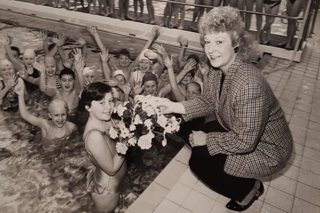 Deborah Fisher, who was ten, presented a bouquet of flowers to Cllr Maxine Callow at the opening of the new learner pool in March 1990