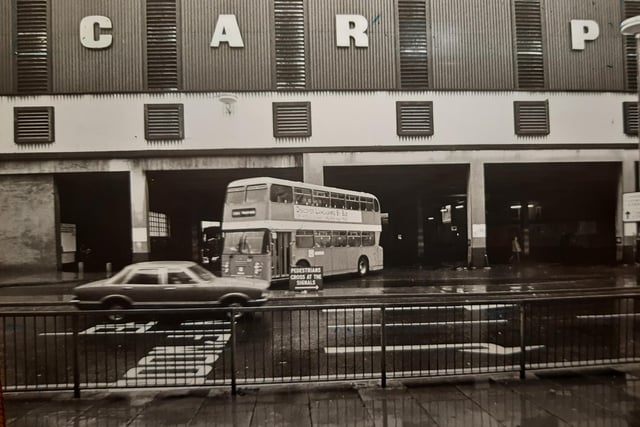A clear sign telling pedestrians to cross a the signals at what was a perilous area to cross the road with buses and cars at every turn. This was October 1982