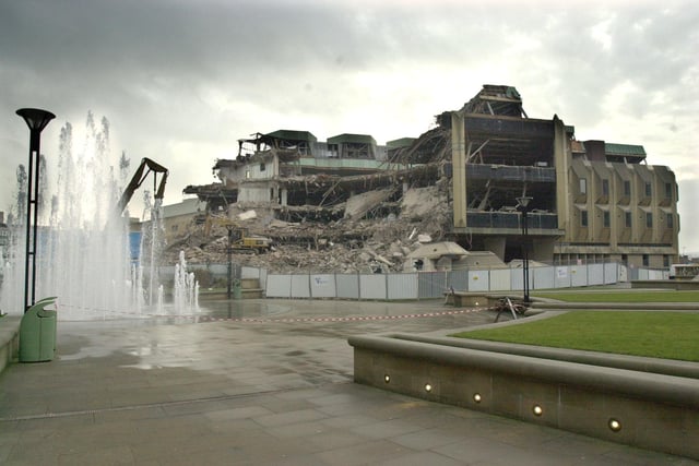 Photographers took pictures of the progress of demolition in January 2002