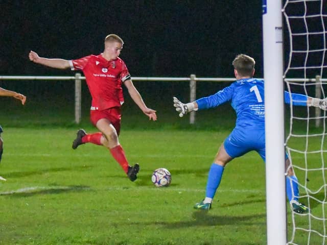 Captain Archie Lang scores for Thornton Cleveleys against Colne Photo: DERICK THOMAS