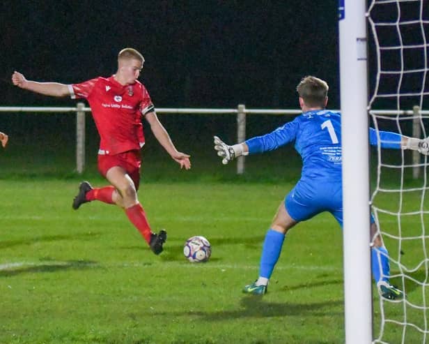 Captain Archie Lang scores for Thornton Cleveleys against Colne Photo: DERICK THOMAS