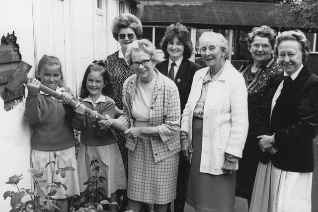 Mrs Audie Stafford delivers the blow which initiates the demolition of the wooden classrooms at Elmslie Girls School on Whitegate Drive. The school was marking its 70th jubilee in 1988 with a £100,000 extension - including a private studies where the 80-odd girls could work in peace for their A Levels. From left: Gillian Clegg (nine), Jane Roberts (seven), Mrs Margaret Gledhill (Elmslie old girl), Mrs Stafford, Emma Sherman (head girl), Mrs Mary Hargreaves and Miss Dorothy Ford (Elmslie old girls) and Mrs Elizabeth Smithies (head teacher)