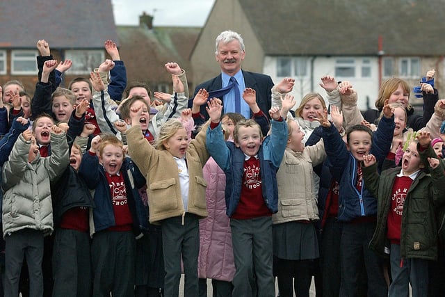 Carr Head Primary School children with heateacher Alan Davies, 2004. They were celebrating a good inspection