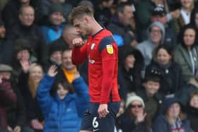 Lindsay leaves the pitch after his red card at Pride Park on Saturday