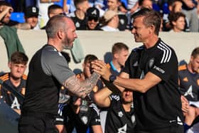 Appleton shakes hands with Leeds boss Jesse Marsch