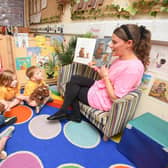 The Learning Tree Nursery on Whitehills Drive is celebrating their recent 'Outstanding' Ofsted report. Nursery practitioner Hannah Singleton  reads to the children.