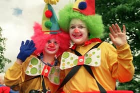 Churchtown Festival clowns, Jenna Russell and Rachel Witte, aged 13, add a splash of colour to the procession