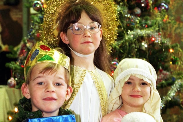 6 year olds Bradlie Clarkson and Catherine Sanderson join 7 year old Nadine Van Der Ruyter for the Mereside CP School nativity in 1996
