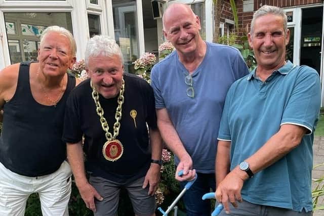 Mark Waddington, Michael Brennan and Paul Naylor  recreate the picture 50 years on with former Blackpool Mayor  Robert Wynne taking the place of his late father Edmund.