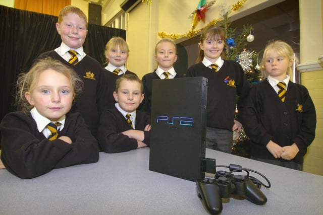Pupils currently on 100% attendance with a PlayStation 2 on offer for the perfect attendance raffle at Chaucer Primary in Fleetwood. Pictured with their eyes on the prize (from left to right) are: Angel Doyle, Jordan Brocklehurst, Jennifer Salthouse, Christopher Doyle, Kiera Grafton, Leanne-Jane Barcock, and Lydia White