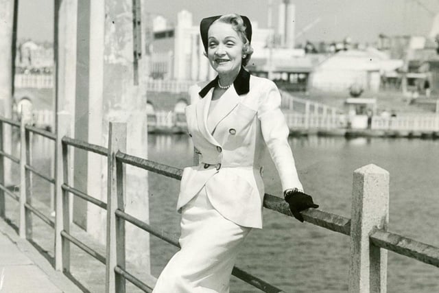 Marlene Dietrich requested a tour of Blackpool after flying into Squires Gate for  her two shows in 1955. She is seen here at the Pleasure Beach