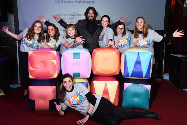 This was when Blackpool Museum 'Showtown' was unveiled at The Blackpool Tower Circus. Laurence Llewelyn-Bowen with some of the staff from Showtown. The museum is due to open in 2023