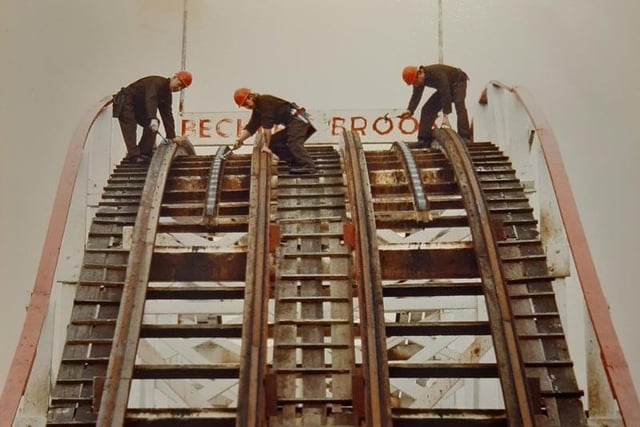 Maintenance workers high up at Becher's Brook on the Grand National