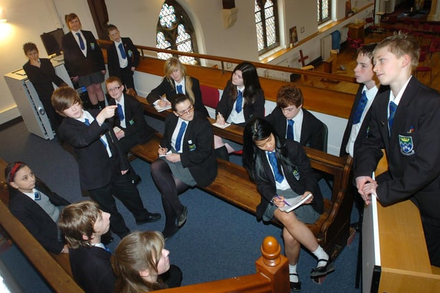 Pupils at St. Mary's Catholic High School in Blackpool took part in a mock trial competition and won through to regional finals. Pictured: Defendant in the dock Joel Dent-Watson (right) faces the court