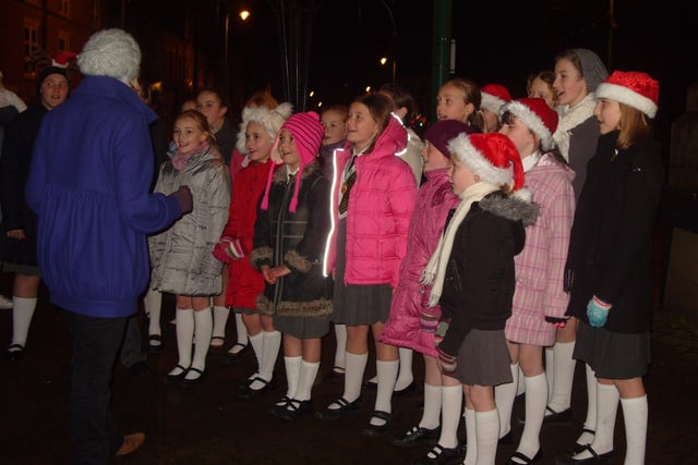 Children sing carols at the Fleetwood Christmas lights switch-on