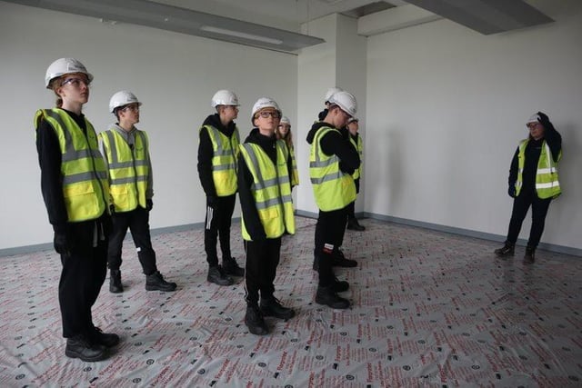 The Year 9 and 10 engineering pupils were shown how the development is coming along by representatives of contractors Wade.