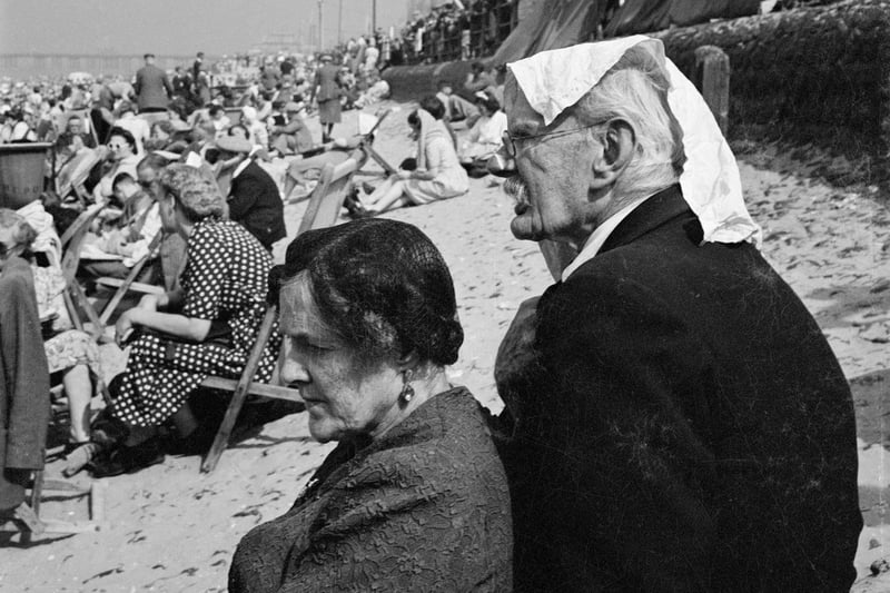 Keeping cool on Blackpool beach, 1940s? Picture credit: John Gay/Historic England/Mary Evans Picture Library