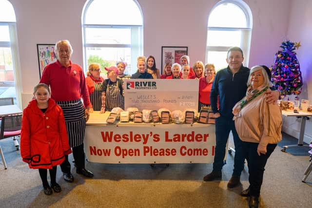 (L) Lily Blackshaw, Paul Caddy from Wesley's, (R) Tom Gallagher and Cllr Brenda Blackshaw with volunteers from Wesley's Community Cafe & Larder.