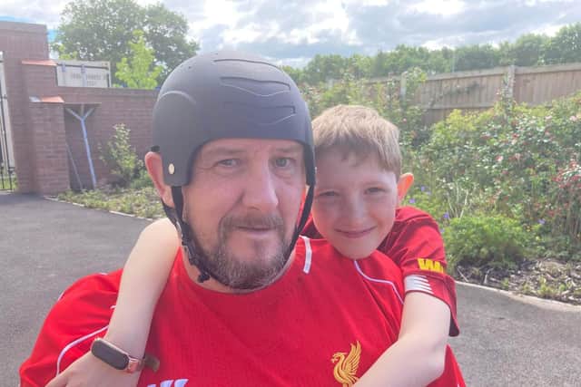 Stephen Allen with his son Zak, 10, who has written a thank you letter to the Sue Ryder Neurological Centre, Fulwood, where he father resides after suffering a stroke