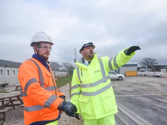 Transport minister Richard Holden (right) with contractor representative Luke Presho at the A585 Windy Harbour to Skippool site