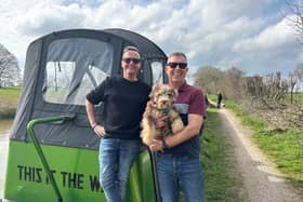 Paul (right) with his partner Anthony (left) and their puppy Sebastian.