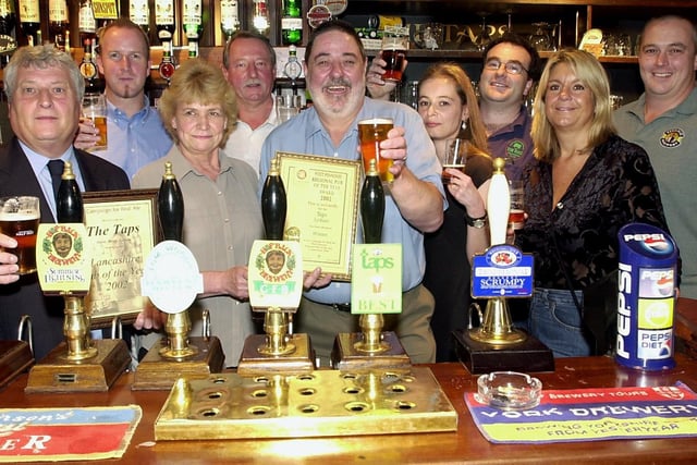 CAMRA have named The Taps pub in Lytham both Regional and Lancashire Pub of the Year. Pictured are landlord Ian Rigg (centre), CAMRA regional organiser Ray Jackson (left), and brewers from across Lancashire who joined in the celebrations