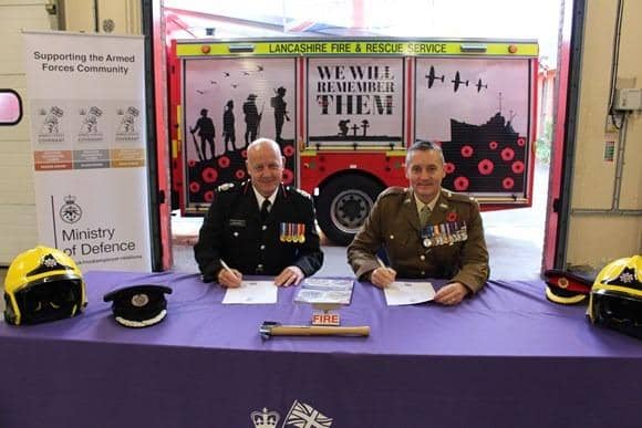 Major Stephen Tickle is photographed with Deputy Chief Fire Officer Steve Healey at the event.
