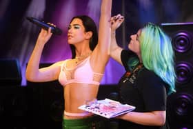 A waxwork of pop sensation Dua Lipa will be spending the summer at Madame Tussauds in Blackpool. Pictured is Emma Meehan putting the finishing touches to Dua Lipa.