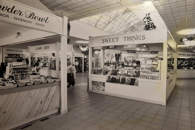 Powder Bowl, Sweet Things and Victoria Bag Shop in the distance in this 1989 photo of Victoria Centre market