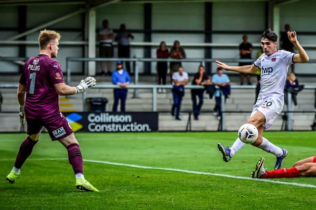 Tom Walker scores AFC Fylde's third goal against AFC Telford United Picture: Steve McLellan