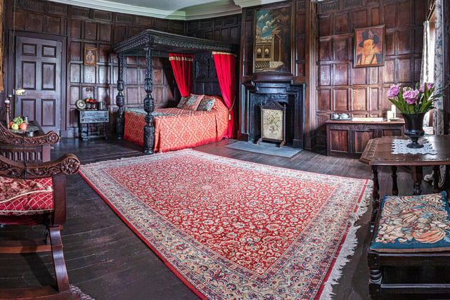 The rich history of the Hall is perfectly reflected in this very impressive panelled bedroom.