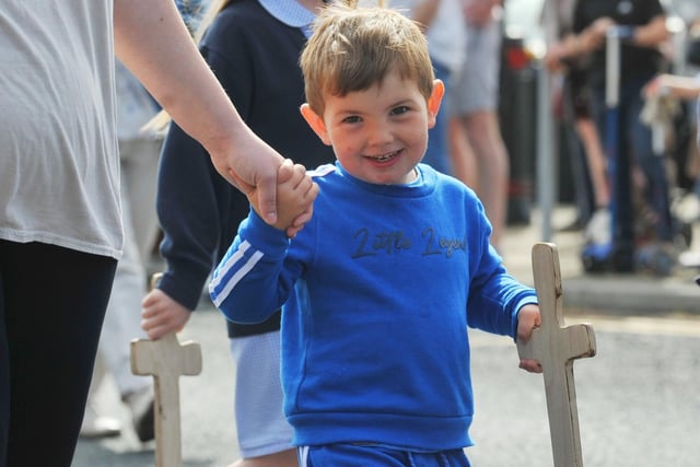 Members of the community take part in the Freckleton Club Day procession through the village.