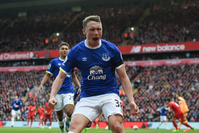 Everton's English defender Matthew Pennington celebrates after scoring their first goal during the English Premier League football match between Liverpool and Everton at Anfield in Liverpool, north west England on April 1, 2017.