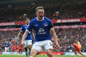 Everton's English defender Matthew Pennington celebrates after scoring their first goal during the English Premier League football match between Liverpool and Everton at Anfield in Liverpool, north west England on April 1, 2017.