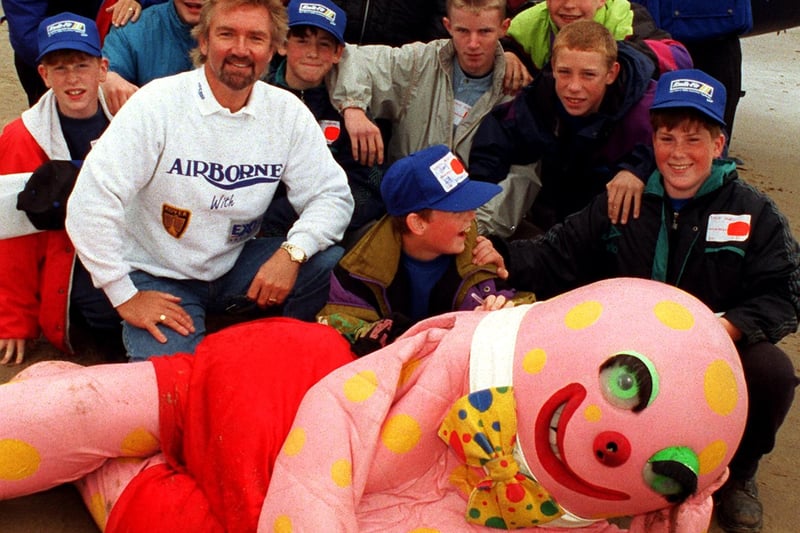 Who can forget Mr Blobby? He always gets a mention when remembering the 90s. The character is pictured with Noel Edmonds before a helicopter flight on Blackpool Beach