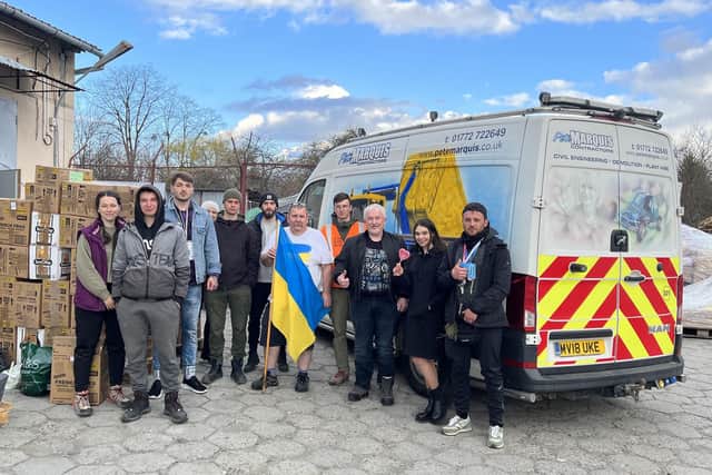 Alan and David Murdock with the Ukrainian team delivering supplies to refugees