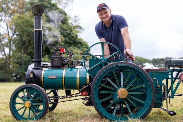 Damian Hardacre with  his dad's fourth scale Foster traction engine at Kirkham and Rural Fylde Rotary Steam Fair at The Villa, Wrea Green.