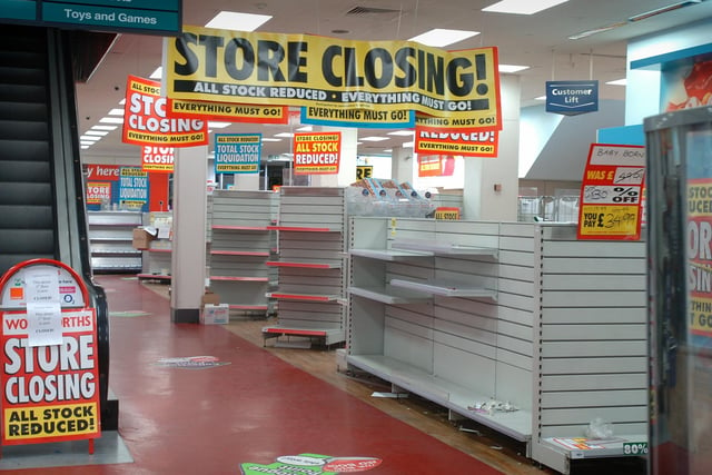 Empty shelves in the deserted Woolworths store on Bank Hey Street after it closed its doors for the last time in 2009