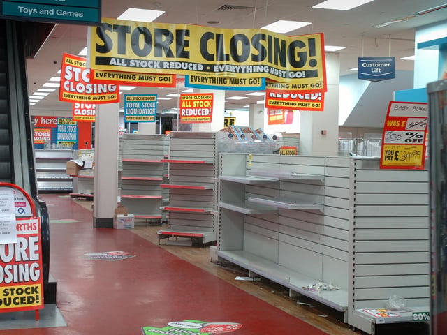Empty shelves in the deserted Woolworths store on Bank Hey Street after it closed its doors for the last time in 2009