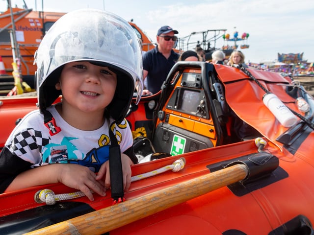 Cobie Crossley, aged five, on board a dinghy at Lytham St Annes RNLI open day. Photo: Kelvin Lister-Stuttard