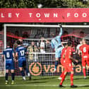 Goalkeeper Chris Neal tips the ball over his bar at Brackley, where a fatigued Fylde side held out for a draw  Picture: STEVE MCLELLAN