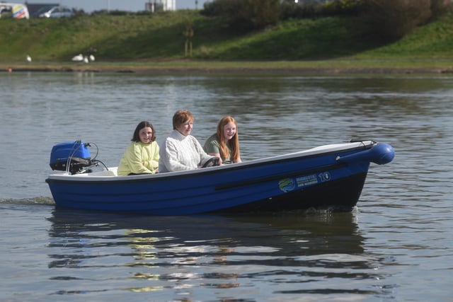 This trio enjoyed a ride on a motor boat at the Fairhaven Lake open day.