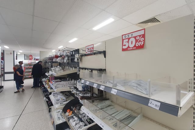 A lot of bare shelves, as people scramble around for a bargain in the tools aisle at Wilkos