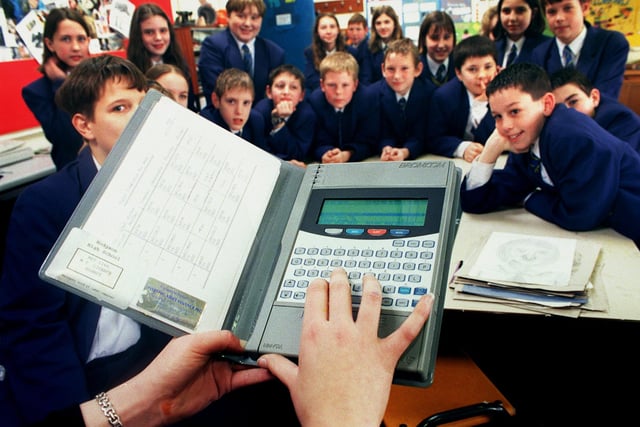 Very 1990s - staff were getting to grips with a new electronic registration and paging system. Our photo shows Class 7M art being checked in by teacher Nyree Goad