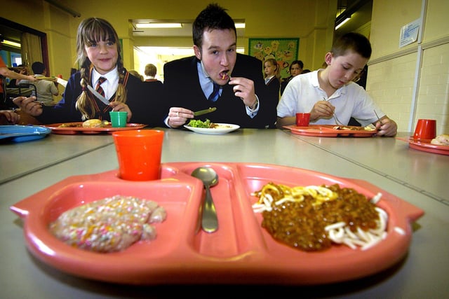 Former Gazette reporter Andy Sykes ate school meals for a week at Waterloo Primary School in 2005
Andy tucks in with Micha McGawley and David Iles