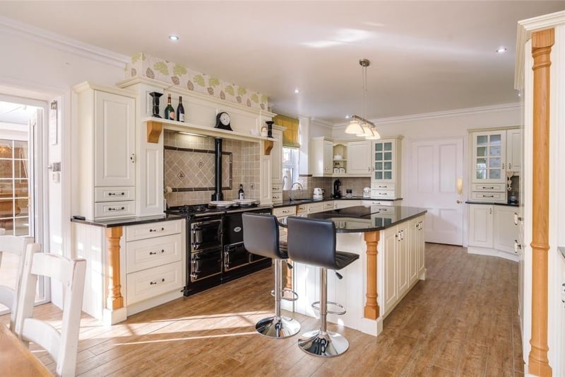 This is a stunning dining kitchen. It's a lovely family room and must be the hub of the whole house. It includes a range of Carl Josef units and a beautiful black four oven Aga